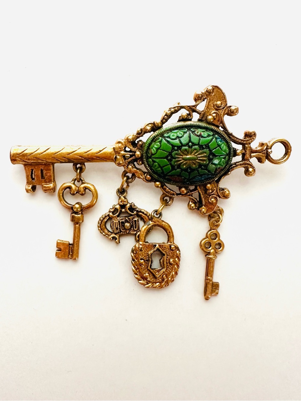 Vintage Lum Gold Key Brooch with Green Enamel Accent